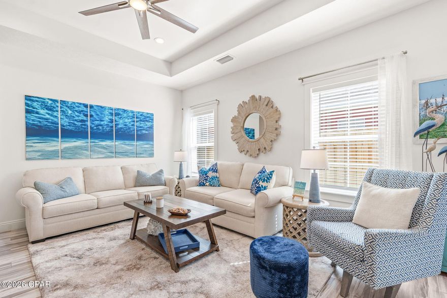 Fully furnished - the ultimate turnkey beach home! This is where comfort and coastal lifestyle
come together in one incredible package. Built in 2016, this beautifully maintained Craftsman-
style home is truly move-in ready.
Step inside to an open, light-filled layout featuring 9' ceilings with 10' tray ceilings and tile
flooring throughout - perfect for low maintenance living. The home has been thoughtfully
refreshed and updated creating a clean and contemporary feel. The kitchen features like-new
appliances (Nov 2024), updated countertops, sink, faucet, disposal and a reverse osmosis water
faucet for premium everyday living (all in 2025). The pantry space has been updated with 6 ft
wood shelves to maximize space. Enjoy outdoor at its best with a spacious 10x20 screened-in
porch (2025) and BBQ area, plus a fenced yard (2025), and irrigation system - ideal for relaxing
or entertaining. A north-facing orientation minimizes direct sun exposure and keeps the home
cooler - resulting in lower energy costs year-round.
Built for peace of mind, this home includes hurricane-rated windows and doors, aluminum
storm covers, a NEW hot water heater, transferable home warranty and termite bond.
Tucked away in a golf cart friendly neighborhood with convenient access to Frank Brown
Recreational Complex just 5 houses away. Enjoy being conveniently located less than 1 mile to
the beach and all that Pier Park offers for shopping, dining, and entertainment. Cruise over to 30A in 20 minutes!
No HOA and with no short-term rentals allowed, offering a quieter, more stable neighborhood
with longer-term neighbors and no constant vacation turnover.
Whether you are looking for a primary residence, second home or long-term investment, this
property delivers unmatched value, lifestyle and convenience - all in one! 
📍 Schedule your showing today and start living the beach life from day one!