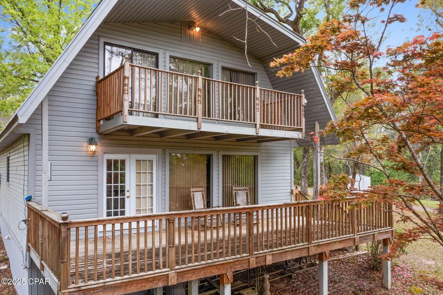 Welcome to your private retreat in Spring Lakes Estates! Nestled on approximately 8.2± acres, this charming 2 bedroom, 2 bath home offers the perfect blend of tranquility and functionality. Step inside this 2-story home and be greeted by a warm and inviting main level featuring a spacious kitchen with breakfast bar, comfortable dining area, and a cozy living room complete with a wood-burning fireplace—perfect for gathering with family and friends. You'll also find a full bathroom, family room, and an oversized laundry room with plenty of space for storage and organization. Upstairs, you'll discover two generously sized bedrooms, another full bath, and a balcony where you can enjoy peaceful views of the pond and surrounding property. Outside is your own private oasis, featuring scenic ponds, a concrete driveway, and a detached garage with a large storage room above—ideal for a workshop, hobby space, or extra storage. Whether you're seeking a serene getaway or a forever home with acreage, this property offers space, comfort, and natural beauty in equal measure. Don't miss this rare opportunity in Spring Lakes Estates!