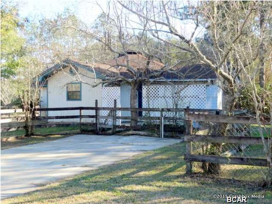 Opportunity Is Knocking! This adorable home sits on a large lot in a quiet setting. This home does have a lot of potential and the price is fantastic! Home sold as is. All information is approximate and should be verified.