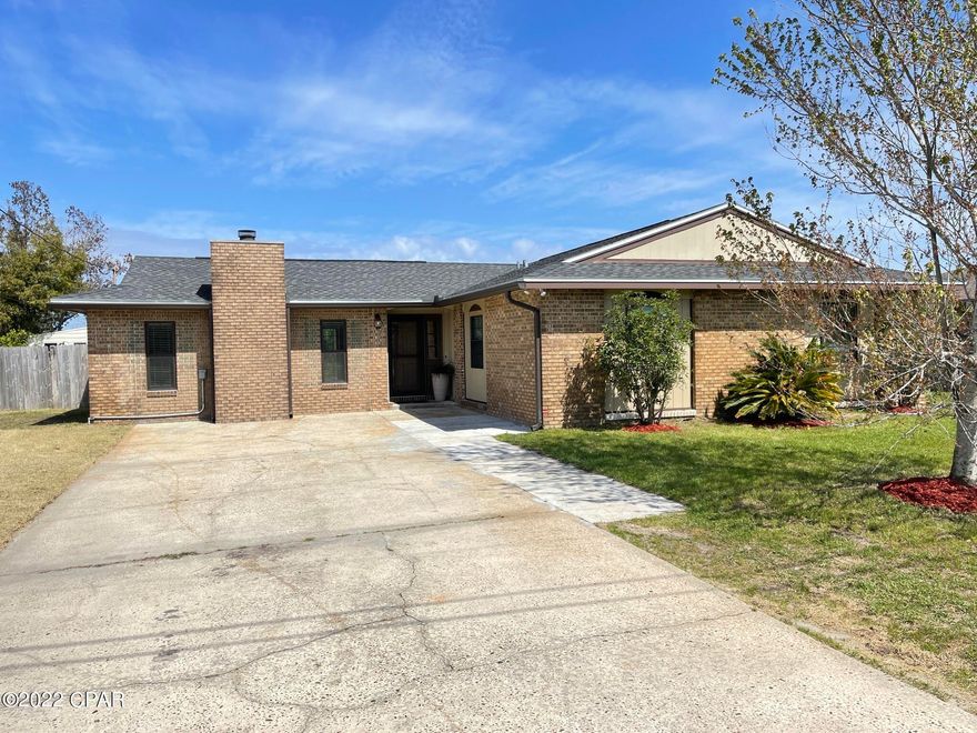 CONGRATZ !! You found it !! An Awesome home in the heart of Panama City, located in the Forest Part Area. What a Great Location, close to the hospital and all 23rd Street shopping. The backyard is truly a central point for the family, besides being part of a really nice brick home. Wait till you see the landscaping and out buildings this home features !!  There are 2 large buildings AND a huge, boat carport !!  The back patio is unique featuring not one BUT two pagodas covering a large, concrete patio.  The patio showcases a coy pond using natural filters, and unique flowers.  All of this sits in a beautiful, landscaped back yard filled with numerous fruit trees. The home features a large den combined with the kitchen for an open, entertaining area. >>>MORE >>> The living room is HUGE and features a decorative fireplace and like the den, has doors going out onto the patio.  If you are working outside and need to clean up, there is a private, outdoor shower at the edge of the patio !!  The master bedroom has it's own unique feature....... a beautiful custom build shower with 2 shower heads and controls.  This home is a MUST SEE and will not last long.