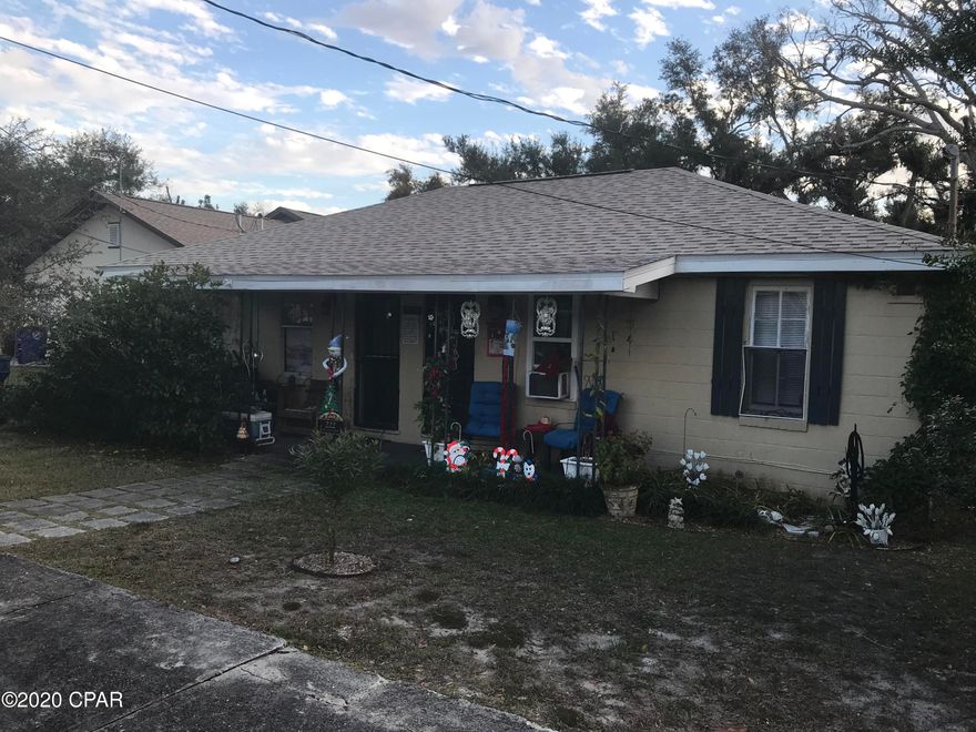 **INVESTORS** Income producing units for sale in the Cove.  Sturdy block house with side by side units. side A has just been updated with new appliances, new window blinds, new carpet has been and freshly painted. All electrical on both sides has been updated.    One renter has been there for 16 years.  Downtown Panama City is only a short walk away.