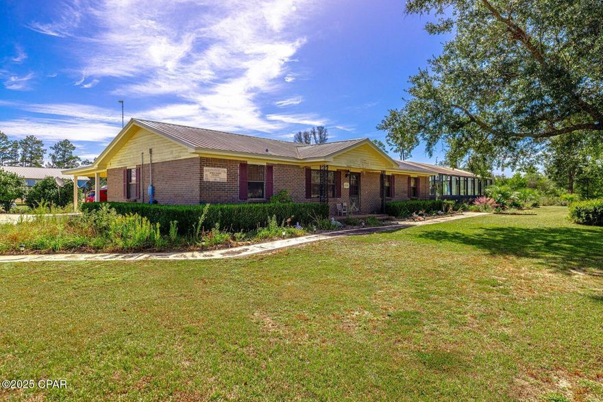 Take a look at this fabulous brick  home with an inground pool on 2 acres plus  in the Cottondale Area and plenty of room to park your RV.
Main brick home features 3 bedrooms and two full bath.  The property is income producing bringing in around $25,000 per year with 3 RV's, one mobile home, and a full apartment.  Main home has a large kitchen with breakfast bar and overlooking the living room.  Additional large bonus and laundry room. Full screened in porch and best of all......a large like new inground pool with hot tub.  The pool is fully screened- in with lanai and has a full kitchen to entertain family members. Exterior land has a large open barn/shed and utility building.  Close to Chipley, Mariana and only 30 minutes away from Panama City Beach.  Don't miss this great opportunity on this primary home and income producing property.   Additional rental income will pay your monthly mortgage.
