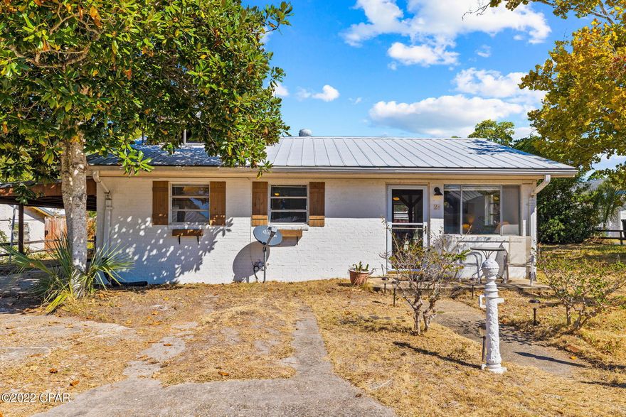 CURRENTLY UNDER CONTRACT, SELLER WILL CONSIDER BACKUP OFFERS. Truly a rare find—priced under $600k and 150ft off 30A! Nestled within the heart of Blue Mountain Beach, this coastal cottage is ideally situated within ½ mile to the beach, restaurants, and shopping. The interior features an open living, kitchen, and dining area as well as tile throughout. With minimal work, the cottage would be ready for rentals. However, the large corner lot and current house layout potentially provide many opportunities, from building an addition, to sectioning off a third bedroom, to doing a complete teardown and rebuild. There are two exterior storage areas, one area designated for laundry and the second area for all your beach toys.