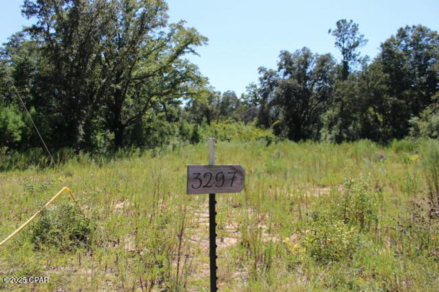 Wooded 1.5± Acre Homesite in Compass Lake in the Hills!  Located just off a paved road, this buildable lot offers a peaceful, natural setting with the convenience of modern access. Ideal for a site-built home or new mobile home—both are now allowed in this area.  The property has been partially cleared to showcase the high and dry buildable area, and electric lines are already at the road for easy connection.  Conveniently located approximately 45 minutes from Panama City and the beautiful Gulf beaches, and halfway between I-10 and Dothan, AL. Nearby Marianna offers shopping at Lowe's, Walmart, restaurants, Chipola College, Jackson Hospital, and recreation at Chipola River and Merritt's Mill Pond.
Just minutes from Compass Lake, you can easily enjoy boating, fishing, or sunset cruises.  Join the CLH's non mandatory POA and have access to all the amenities including McCormick Lake which is for members only.  A no gasoline engine lake for swimming & fishing. This area of the subdivision has well established maintained beautiful homes and is seeing more new construction .   Build your dream getaway or full-time home from the ground up and make it your own!  Owner Financing Available