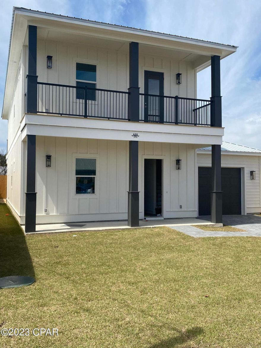 Beautiful 2 story Beach House. Short distance to the Gulf of Mexico. Entered as a comp only.