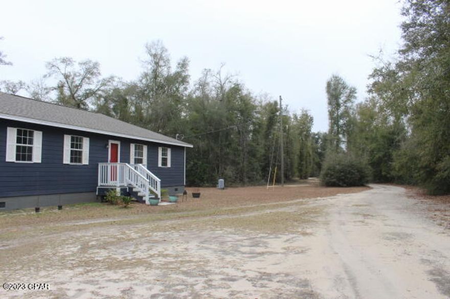 'CURRENTLY UNDER CONTRACT, SELLER WILL CONSIDER BACKUP OFFERS'  If privacy is a must this one comes pretty close to being close. The 5.12 Acre property lines are thick with woods that keeps you private and secluded from your neighbors.  There's plenty of room to build to add your essentials.  Split bedroom floor plan.  If you work from home, there's an office.  The current owner has business internet with Comcast with super fast speed.  New roof down to the trusses installed in 2021. Deeded easement to the property.