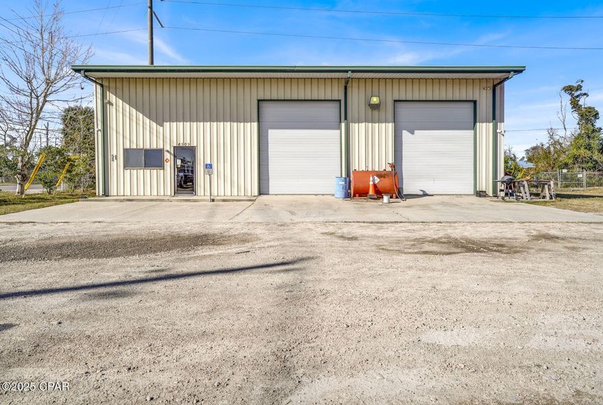 Flex Warehouse space with large shop area two large roll up doors, office space and a loft. Includes the parcel next door for parking and lay-down yard. Over 1 acre. Fully fenced. Additional open pole barn for storage. Survey available.

Ceiling clearance is 18 - 19 ft. Each Roll up door is 13'11'' (H) x 11'11'' (W).  
Building is 60x40. Shop space is roughly 45x40 with a full restroom
600sf office space with 3 total offices, including a front office area and two restrooms. 
Loft area over entire office is roughly 600sf

Chainlink security fence around the perimeter. 3 gates provide access with primary access through rolling gate on 22. An additional double gate on 22 provides convenient access to lay down yard and a third gate on the West fence at the northwest corner. 

Alarm and security system already in place with multiple cameras throughout. Owner occupied. Call today for private tour.

All measurements are estimated. Information deemed reliable. Buyer should verify all important details.