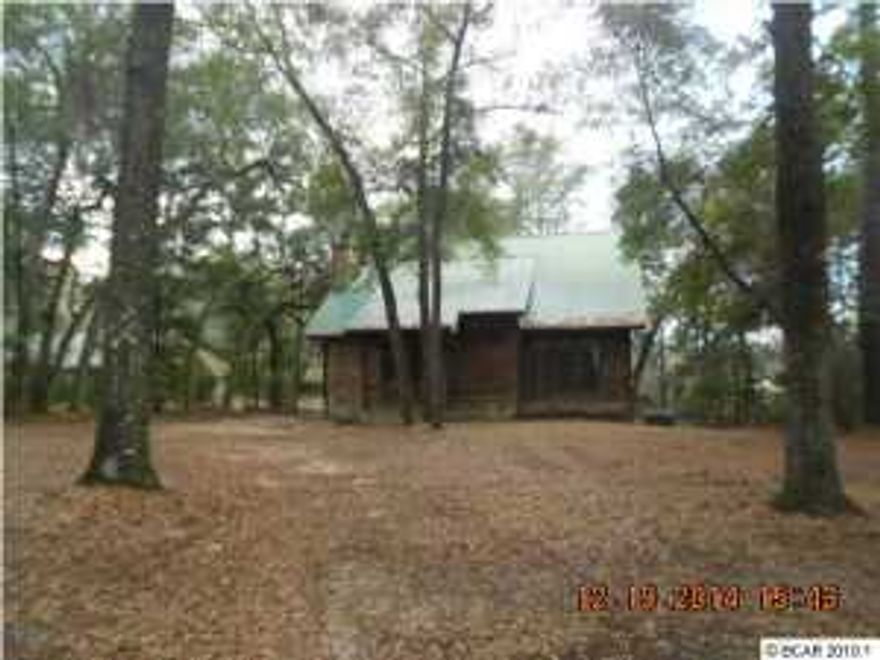 Beautiful 3 bed 2 bath two story home on the Black Hole Pond in the Paradise Lakes subdivision. Master bedroom is on the 1st floor. Large deck off Dining and Kitchen overlooking the Pond. The interior has been freshly painted. Home has new appliances and carpet. Ready to make this your getaway 2nd home or live full time. Also has a dock to enjoy fishing. Seller will offer an allowance up to $500 to owner occupant Buyer's purchase of a home warranty of their choice. Seller is offering ''Homesteps Special Financing ''to qualified buyers. IN ADDITION to normal Buyer closing costs, Buyer pays Doc Stamps on the Deed, closing service fee of $250, electronic recording fee of $27. Seller does not complete mold or problem drywall remediation or provide any type of clearance or certification to