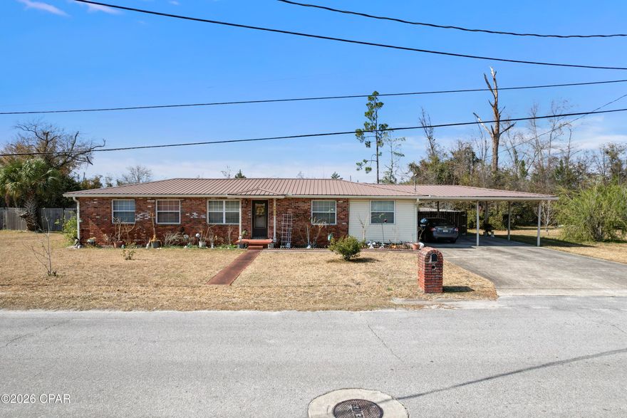 1412 Alabama Ave | Lynn Haven, Florida

Right in the heart of Lynn Haven sits a piece of old Florida charm you just don't find anymore. Welcome to 1412 Alabama Avenue — a home that carries that sweet Southern character and small-town warmth we all grew up loving.

From the moment you pull up, you'll feel it — mature trees, a welcoming presence, and the kind of setting where neighbors still wave as they drive by. This home has that timeless, ''they don't build them like this anymore'' feel, full of personality and ready for its next chapter.

Out back, you'll find a garage that could use a little TLC, but the potential is undeniable. Whether you're dreaming of a workshop, extra storage, or restoring it to its full glory, the opportunity is there.

And here's the part that truly makes this property special — an unheard-of triple lot right in the middle of town. Space like this in Lynn Haven is incredibly rare. Room to expand, garden, build, or simply enjoy the elbow room that's nearly impossible to find this close to everything.

Want even more possibilities? This property could also be sold together with 1408 Alabama Ave, creating a full acre in the heart of town. A whole acre. In Lynn Haven. That's the kind of opportunity investors and visionaries wait for.

Close to parks, schools, local shops, and all the hometown favorites that make Lynn Haven so special — this is more than just a property. It's a chance to own a slice of classic Florida living with room to grow.

If you've been waiting for character, land, and location all in one... this might just be it. 🌿✨