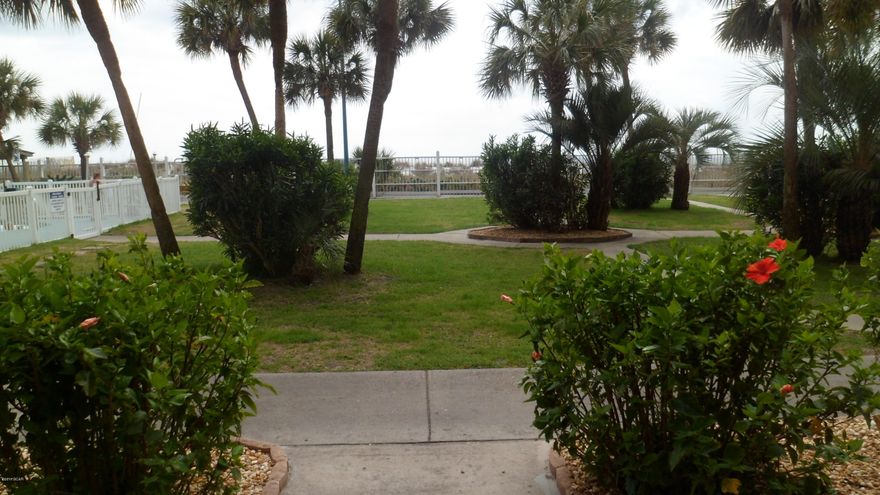 No elevator needed! Bottom floor patio opens up to the green area beside 'Bikini Bob's' snack bar and hot tub area.  The Gulf of Mexico can actually be seen from this gorgeous unit bottom floor unit.  This just may be one of the nicest units in The Summit.  Nicely furnished, ceramic tile floors throughout. Easy access to complex laundry facility so no room is taken up in this unit by a washer and dryer. Clean, Clean, Clean! You really need to see this great unit.