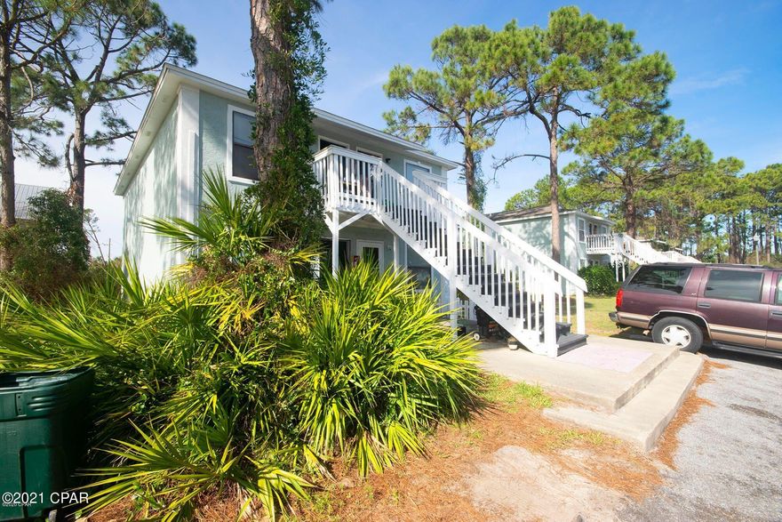 **CURRENTLY UNDER CONTRACT, SELLER ACCEPTING BACKUP OFFERS** Great price on this second floor apartment located in a quiet golf cart friendly community Hidden Lagoon, just north off North Lagoon dr, close to the Navy Base, shopping, gorgeous Saint Andrews state park and beaches. This is the lowest price on the beach unit at the moment of listing. One bedroom, one full bathroom, full kitchen and family room, balcony. With some TLC will be great as a primary residence, vacation home or as an investment property. Low HOA fees at $192 per month that includes water, sewer, cable, pest control, garbage, and insurance. Call today to schedule a showing!