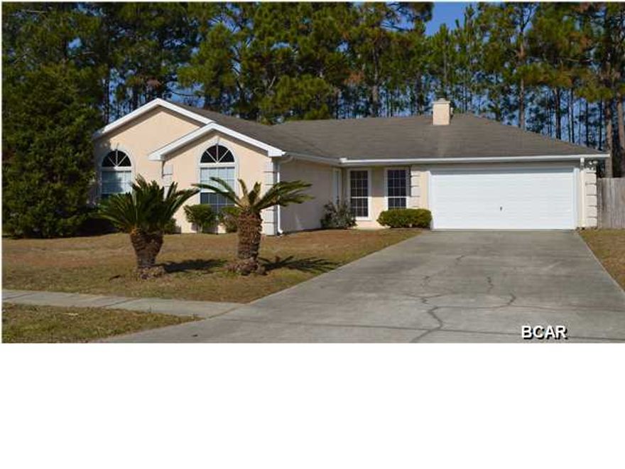 FOUR BEDROOM HOME NEAR TAFB! This home sits in a nice, private subdivision that has sidewalks and is near the water. It is also near shops, restaurants and the Air Force Base. The home has recently been updated with fresh paint and the hardware has been updated. There is a cozy fireplace with a large, open living area off the kitchen/dining area. The Master Bedroom has it's own private door outside to the fenced back yard. There is a nice screened room of the back of the home that overlooks a deck. This is a great price for a 4 bedroom this nice!