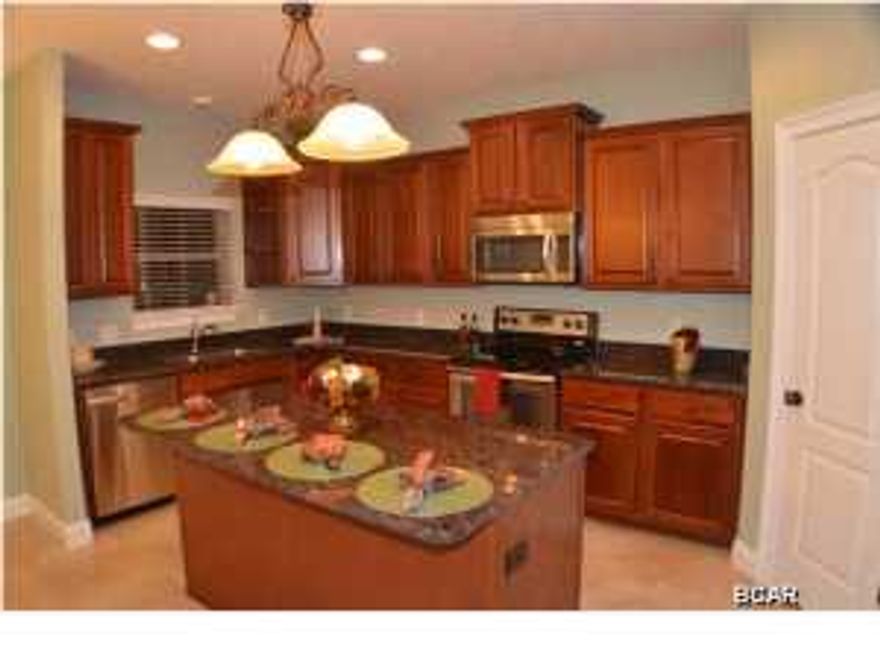 Elegant Quality Built OVER 2,000 sqft NEW Construction Home! This Beautiful Home features 4 Spacious Bedrooms and 2.5 Baths, The open split floor plan is great. You will know your in a quality built home the moment you step through the doors. The Interior Features warm inviting wall colors sure to match any decore, tray ceilings in the Living room and Master Bedroom, recessed and upgraded light fixtures throughout, Hardwood, Ceramic Tile and high quality carpet in the bedrooms. The Kitchen is a true show stopper with hardwood cabinetry, granite countertops, stainless appliances & large 4x4 walk-in Pantry. There is a kitchen island with breakfast bar and also a large 11x12 dining area with beautiful custom lighting. The Master Suite is the perfect place to relax, the large spacious