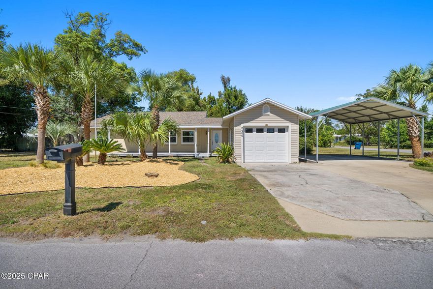 Centrally located in the sought after Historic St. Andrews community, this move in ready ranch style block home sits proudly on a corner lot and offers both character and comfort. A large front porch framed by palms welcomes you, while the fully fenced yard with two double gates provides space for pets, play, or parking. Inside, the open floor plan features a spacious living room with large windows and a built-in bookshelf, flowing seamlessly into the kitchen. The kitchen is equipped with stainless steel appliances, abundant counter and cabinet space, a center island, and a dining area with direct access to the backyard. Just off the kitchen is a combined walk-in pantry and laundry room, with the washer and dryer conveying with the sale. The split-bedroom floor plan provides privacy, with two bedrooms and a full bath on one side and the master suite occupying its own wing. The expansive master retreat showcases a newly renovated en suite complete with a walk-in closet, double vanity, and standing shower. Located in one of the most desirable areas of St. Andrews, this home keeps you close to the best the community has to offer. Nearby attractions include St. Andrews State Park, Pier Park, and the Historic St. Andrews Waterfront District, filled with shops, live music, coffee houses, and a popular farmers market. Parks, schools, churches, and boat ramps are also just minutes away. Don't miss the opportunity to call this charming property home, schedule your private showing today!