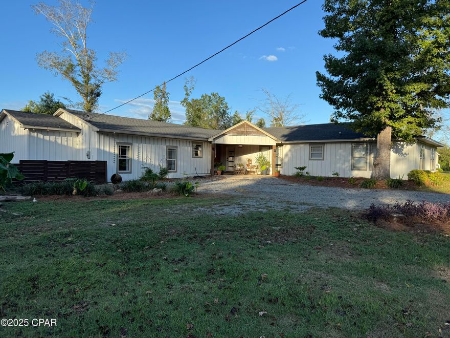 Beautifully renovated 3BR/2.5BA home offering 3,178 sq ft of living space located just outside of Marianna in a desirable, family-friendly neighborhood. Completely updated approximately five years ago, this spacious home features modern finishes, and an open floor plan with cased openings that make it feel intentionally cozy. This home has character! 



The large kitchen includes custom cabinetry, quartz countertops, large island with black walnut top for prep and casual dining, and a butler's pantry. The kitchen opens up to a drawing room with vaulted ceiling and original wood-burning fireplace! The open shelves, island top, beam in drawing room and fireplace mantle are all from the same black walnut tree from the property after Hurricane Michael.  This home is perfect for entertaining and the flow works with large and small groups. The primary suite offers his and hers closets (one is a walk-in) and a beautifully updated ensuite bath with dual vanities and tiled shower. 



Additional highlights include two guest bedrooms, a convenient half bath, laundry room, a closed in garage space that would be the perfect 'romp room' or playroom for young kids and a large detached garage/workshop ideal for vehicles/boat, storage, or hobbies. There is also a convenient outdoor storage closet with refrigerator attached to the house. Enjoy outdoor living with a privacy-fenced backyard, open deck, and plenty of space for family and pets.



Property features:

    - 3 bedrooms / 2.5 bathrooms

    -  3,178 sq ft heated and cooled

    - Fully renovated in 2020

    - Butler's pantry

    - Open-concept layout

   -  Large detached garage/workshop

    -  Privacy-fenced backyard with open deck

    -  Located in a quiet neighborhood just minutes from town



Move-in ready and meticulously maintained â'' this home offers the perfect combination of comfort, space, and location.