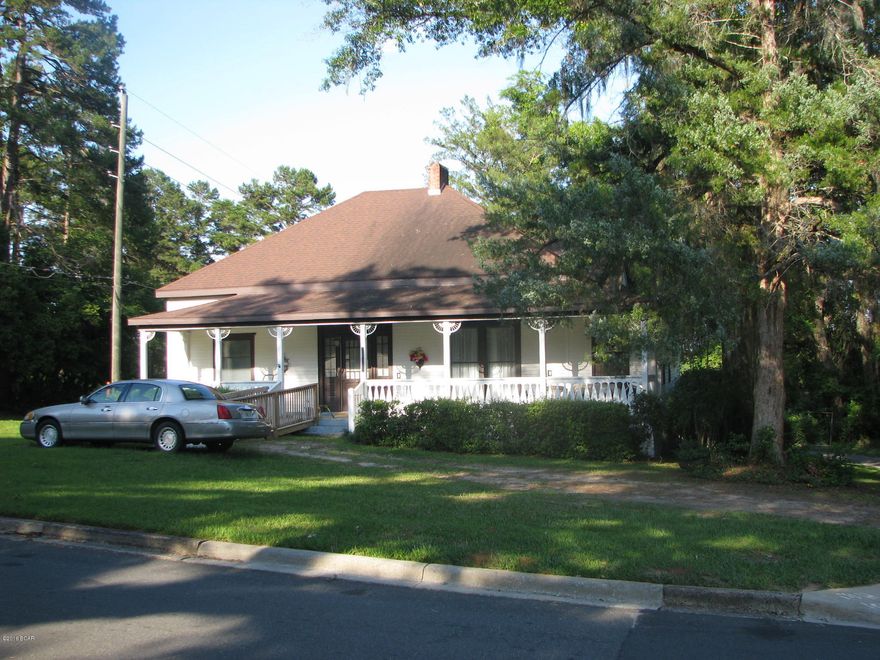 Very nice southern style home located in downtown Marianna. This home is move-in ready and has all of the unique features of an older home including: 12 foot ceilings, 6'' crown molding, multiple fireplaces(may need inspecting), large bedrooms, an updated kitchen, and a large front porch. Home has had some recent things done to it including: newer kitchen cabinets and countertops, new vinyl flooring in master bath, new duct work under home. Roof and A/C are approx. 4-5 years old. This home is located just around the corner from Chipola College but convenient to all other schools and everything that Marianna has to offer. Underneath the carpet throughout lies the old hardwood floors that could be refinished to bring back the charm of this beautiful older home.