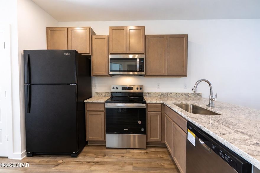 Be the very first to call this brand-new 3 bedroom, 3 bath townhome your own. This immaculate home has never been lived in and offers a thoughtfully designed floor plan with modern finishes throughout. A downstairs bedroom with full bath provides the perfect option for guests or multigenerational living, and is especially convenient for anyone who prefers to avoid stairs. It could also serve as a quiet home office, giving you flexibility to suit your lifestyle.

The kitchen features all new appliances and an open layout that makes both cooking and entertaining easy.

Enjoy the peace of mind of zero delayed maintenance that comes with new construction, along with the convenience of being located just 6 miles from Tyndall Air Force Base. A dog park within the community adds an extra layer of lifestyle appeal for pet owners, and yes—pets are welcome here.

With its fresh construction, modern amenities, and prime location, this home is move-in ready and waiting for you.

*The home pictured is the same floor plan, but a reverse swing/mirror image of available home.