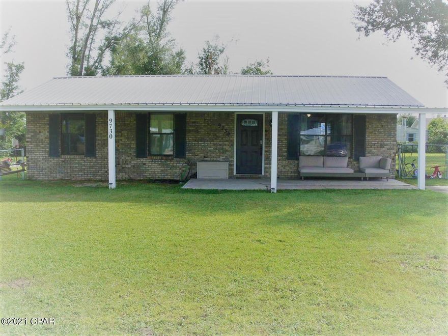 You could be coming home to this beautiful 4bed/2 bath home in the country only 25 min from Panama City, 39 min from Panama City Beach. It has a lot to offer for a growing family with plenty of yard space 'over a half acre'' for children to play or room for your toys. The home has had many updates including new exterior and interior doors , window screens, large wooden deck on the rear of the house with a new large shed in the backyard for storage. The front covered porch has also been recently extended to the length of the home in 2021 with a porch swing to relax in. The interior of the home has ceramic tile throughout and the Master bedroom is enormous. Three additional bedrooms give you room for a growing family or that extra office.  If you're looking for peace and quiet, here it is.