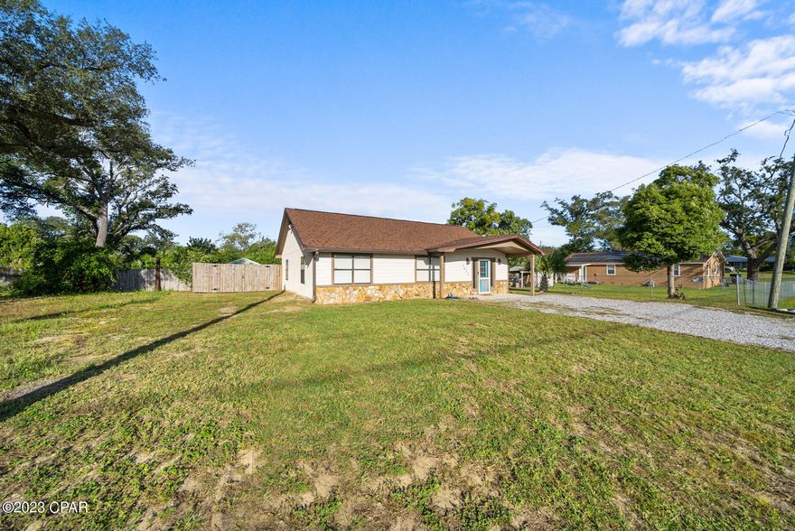 **Charming Home with Unique Character Awaits!** 

Step into a world of charm and character as you explore this beautifully crafted home in this conveniently located Panama City home with NO HOA! 

Key Features: 
- **Distinctive Design:** The ship lap in the expansive kitchen adds a touch of rustic elegance, making it a focal point of the home. 

- **Modern Finishes:** Enjoy the durability and aesthetics of wood-look tile flooring throughout, paired with a soaring cathedral ceiling and recessed lighting that brightens every corner. 

- **Gourmet Kitchen:** A spacious eat-in kitchen bar, complemented by granite countertops, ensures every meal is a memorable experience. 

- **Bathroom Elegance:** Dive into comfort with bathtubs adorned with stylish subway tiles, offering a spa-like ambiance. 

- **Optimized Space:** The home's design ensures every square foot is utilized to its fullest, maximizing functionality without compromising on style. 

- **Outdoor Oasis:** Envision your dream backyard in the expansive outdoor space, already equipped with new fencing for privacy. Whether it's a garden, playground, or relaxation zone, the possibilities are endless. 

- **Additional Features:** A spacious shed in the backyard provides ample storage or can be transformed into a workshop. Plus, enjoy peace of mind with a new roof installed in 2019. Owner also just paid to replace an older Challenger Electric Panel for a brand new one for more peace of mind. 

Nestled in a sought-after neighborhood, this home offers a blend of traditional charm and modern amenities. The unique character elements ensure it stands out from typical new builds, making it a rare find. Act quickly, as homes with this level of charm and detail are in high demand and won't last long! 

Contact us today to schedule a viewing and experience the magic of this property firsthand.