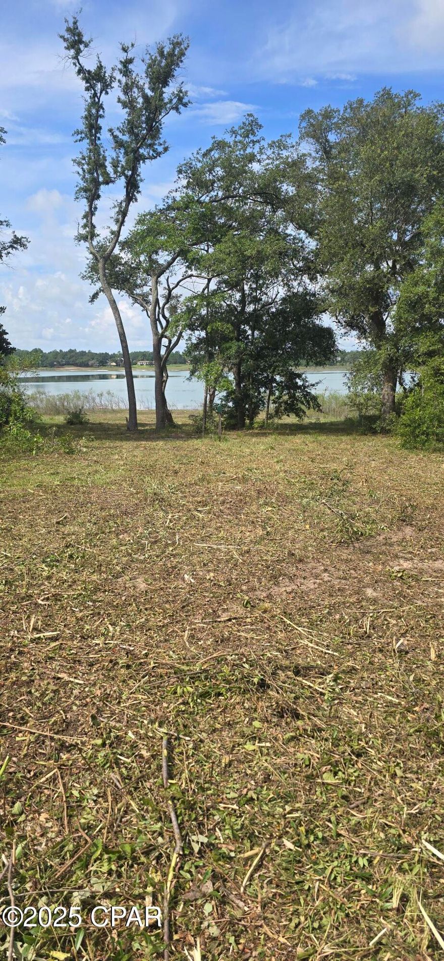 Cleared vacant lot on desireable Boat Lake in the Sunny Hills community. One of the last lots remaining on Boat Lake. Lot is cleared and ready for you to build your dream home and relax by the lake. Survey available.