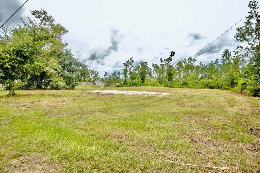 CURRENTLY UNDER CONTRACT, SELLER ACCEPTING BACKUP OFFERS.

1 acre lot with septic & well with new pump! Ready for hook up for your new home or mobile home.
