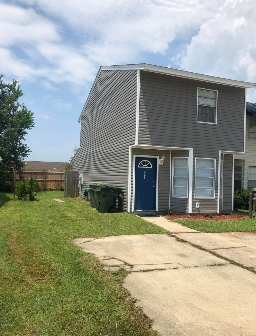 CURRENTLY UNDER CONTRACT,  SELLER ACCEPTING BACK UP OFFERS!  This Move In Ready 2 Story Townhouse is a MUST SEE!!! Centrally Located In The Heart of Lynn Haven within Walking Distance to Publix, Starbucks, Walmart, Post Office and Many Other Great Restaurants and Stores.  This home has been recently renovated including New Roof, Vinyl Siding, Interior Doors, Ceiling Fans, Fixtures, & Fresh Coat of Paint all in 2019 and HVAC & Hot Water Heater replaced in 2014.  Other great features include; open concept living/dining combo w/ ½ bath, galley style kitchen w/ spacious pantry, and full size laundry with ceramic tile floor. Upstairs you will find 2 large bedrooms with nice sized closets, a full bath and spacious linen closet with beautiful laminate flooring. Outside features an enclosed lanai w/ large storage room, and a nice size back and side yarThere are 2 designated parking spaces in front, that are large enough for 2 full sized trucks or 3 small vehicles. All info/sizes are approx, please verify if important! Property sold AS-IS! Seller offering a $3000 Kitchen allowance w acceptable offer.