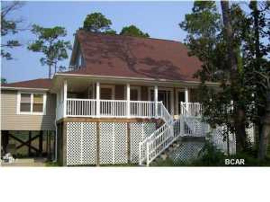 Beautiful 2 story 5BR 3BA home with water view, large covered porch and open decks for entertaining. This home has a wood burning fireplace, formal dining, bonus room and much more. (A Must See)