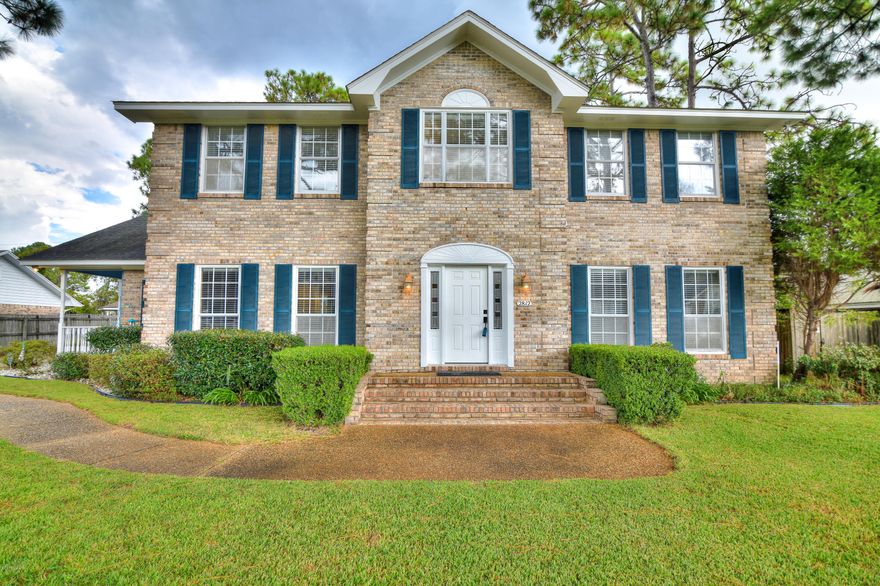 Gorgeous, brick home with 4 bedrooms 3 baths AND a office/formal living room/bonus room. This home has it all...A dream kitchen with ample cabinetry, backsplash, stainless steel appliances (with new dishwasher), double oven, island, huge pantry, beautiful tile floors, and pull out spice rack. Living room with fireplace, formal dining room, full bathroom downstairs, large laundry room, 2 car garage, lots of parking that will accommodate a large RV, and a big backyard with fire pit and playground equipment (circle swing not included). 4 spacious bedrooms upstairs and 2 full baths. Master bedroom has a bay window and 2 walk in closets, master bathroom with double vanity and jacuzzi tub. All info/sizes/measurements are approx, please verify if important!