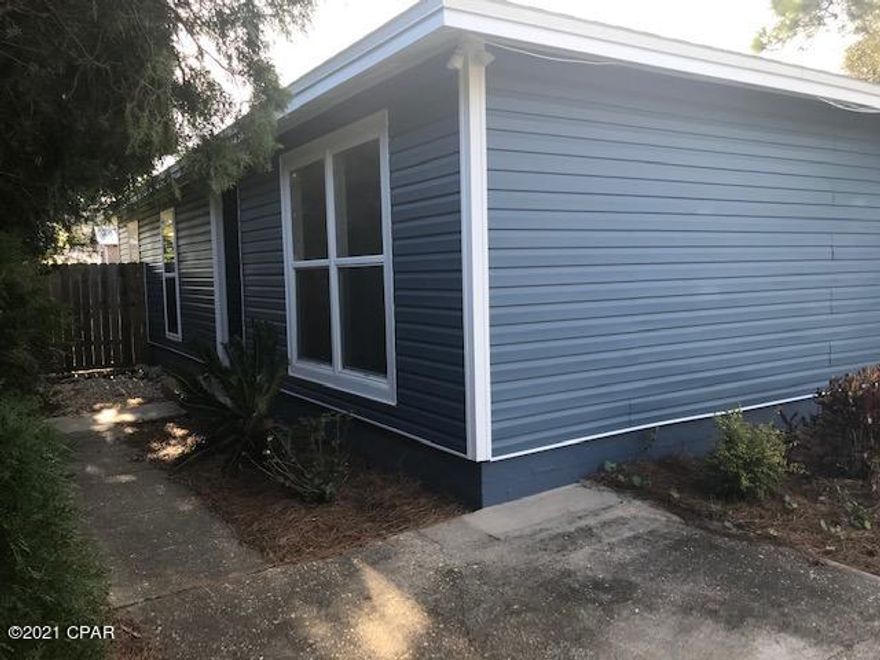 Location, Location, Location!! Live & play in Panama City Beach in this wonderful Beach House! This lovely 3 bed 1-1/2 bath (master bath has no shower) This home has a large fenced backyard & is nicely updated inside and out. Kitchen has new stainless steel appliances & granite counter tops, bathrooms have new vanities & toilets, new vinyl plank flooring, ceiling fans, lighting & fresh paint through out. You'll enjoy Boating, Swimming, Fishing and much more  so bring your water toys, Best of all, you won't have far to go as it's only a block and a half from the Dolphin Boat launch with access to St. Andrews Bay & it's with in walking distance (0.3 of a mile) of the Gulf of Mexico. Plenty of dining and shopping options as well. Call today to schedule a tou