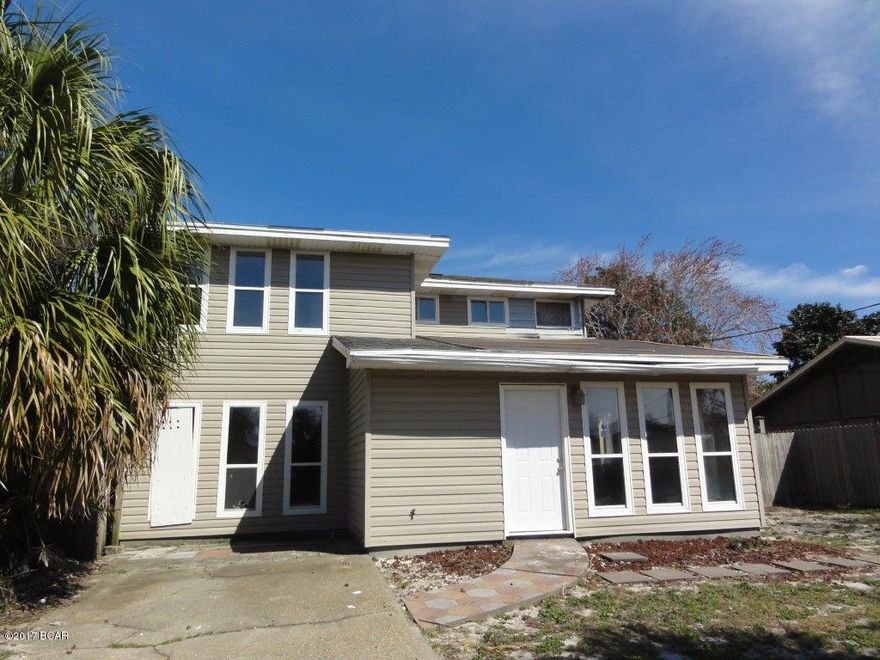 2 story home in Lakeside Villas Subdivision! Level lot with privacy fence and storage building! Backyard covered patio and second level deck! Kitchen features tile counter tops, white cabinets with tons of storage, and breakfast area with vaulted ceilings! 2 story living room! Spacious bedrooms with hardwood floors! Don't miss out! Show and submit your offer today!