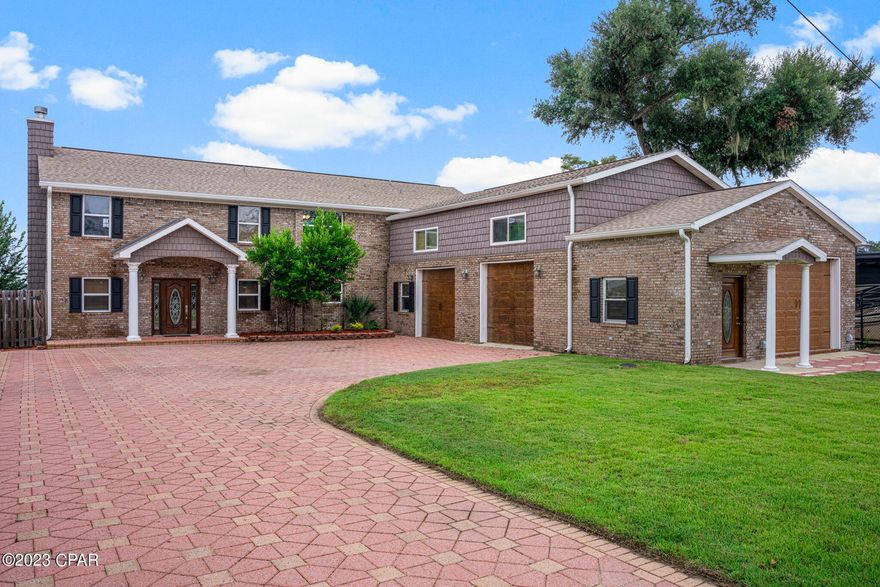 UNDER CONTRACT.. SELLER IS ACCEPTING BACKUP OFFERS. 
Seller is offering owner financing for qualified candidates. $100,000 down, 6% interest rate, 30 yr amortization and 5 Yr. Balloon.
Welcome to your dream lakefront retreat! This stunning two-story home boasts an expansive layout with four spacious bedrooms and four luxurious bathrooms, offering you the perfect blend of comfort and style. Nestled in the quiet neighborhood of Deer Point, this property presents an idyllic escape from the hustle and bustle of everyday life.

As you step inside, you'll be greeted by an inviting foyer that leads you into the heart of the home. The open-concept design seamlessly merges the living and dining areas, creating an ideal space for entertaining guests or spending quality time with loved ones. Large windows adorn the walls, allowing for an abundance of natural light to fill the rooms and offering breathtaking views of Deer Point lake.

The gourmet kitchen is a chef's delight, featuring top-of-the-line appliances, ample counter space, and cabinet space. Whether you're hosting a formal dinner party or preparing a casual meal, this well-appointed kitchen is sure to impress even the most discerning culinary enthusiasts.

With one of 2 Master Bedrooms in the home being  on the first floor, upstairs you'll find a second master with private bathroom and 2 additional bedrooms, and a 3rd bathroom. A highlight of the 2nd story is the large bonus room with a private balcony overlooking the shimmering waters of the lake, perfect for a family room, game room or 2nd living room space.

Stepping outside, the property truly shines. A double boat house awaits, providing convenient access to the lake for all your water-based adventures. Spend your days cruising the waters, fishing, or simply basking in the sun. Adjacent to the boat house, an inviting inground pool invites you to take a refreshing dip or lounge poolside while enjoying the panoramic views.

A major feature to this home is the 1300 sq.ft. Garage with 3 garage doors, storage loft and its own private bathroom. It's a dream for car enthusiasts.

This home is not just a retreat; it's a lifestyle. Imagine sipping your morning coffee on the expansive deck, hosting unforgettable gatherings in the spacious backyard, or simply unwinding in the comfort of your own private sanctuary. With its prime location, luxurious amenities, and unparalleled natural beauty, this lakefront gem offers a truly extraordinary living experience.

Don't miss the opportunity to make this exquisite lakefront residence yours. Schedule a showing today and let yourself be captivated by the beauty and serenity that awaits you.