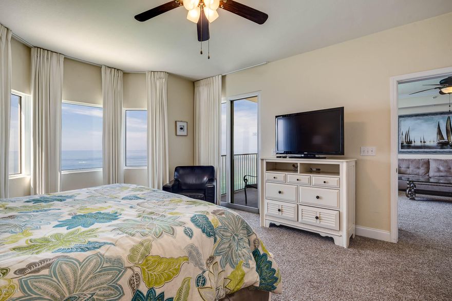 UPGRADED 3 bedroom condo at Tidewater! This is a spacious 3 BR condo with 1865 SF. This unit has an upgraded kitchen and bathrooms with wood cabinets and thick granite. The owners just replaced the flooring with brand new carpet so it's in pristine condition. The large living room and beach front master bedroom both open up to the balcony. The master bathroom features a separate shower and bathtub, a huge walk in closet and double vanities. Tidewater 2202 features plenty of interior storage but in case that's not enough, it also comes with the large linen closets (as seen in the photo section) located in the stairwell right outside of the unit. This condo has it all and will not last long. Tidewater offers the best array of amenities on Panama City Beach; a gulf front gym with great views, 4 hot tubs, 2 outdoor pools, 1 indoor heated pool, game room, saunas, steam rooms, a restaurant, poolside Tiki bar, a convenience store, movie theater, covered parking, a conference room & an owners lounge. TIDEWATER IS ONLY 1/2 MILE TO PIER PARK!! GREAT LOCATION!!