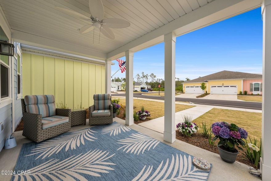 Latitude Margaritaville Watersound is a active adult 55+ community located just 8 miles from the sugar white sands of the Gulf of Mexico. This Gorgeous Bamboo Cottage has all the bells and whistles on a RARE OUTSIDE facing lot (no cottage in front of home). Lush large front yard, fully maintained by the HOA with wonderful views from the spacious front porch. Highly upgraded with tile floors throughout, feature walls including shiplap in family room & dining room, ceiling beams and custom paint finishes. Kitchen with beautiful rich dark wood tone soft-close cabinets/large drawers, quartz countertops, built-in double garbage cabinet and more. The Bamboo cottage has a large walk-in laundry room. Master suite boast a fully tiled master shower, quartz countertops and an over-sized master closet. Wonderful primary or secondary residence! The community sits perched along the Intracoastal Waterway with a 2 story restaurant, resort style pool, state of the art fitness facility with a indoor lap-pool and spa, workout equipment, spin classes, yoga, dance and more! Pickleball and tennis courts, bocce ball, ping-pong, a putting green, kayak launch and much more! Golf Cart friendly community with walking/running/golfcart trails, activities year round. Live Music/entertainment everyday and at the Band-Shell on Fri/Sat nights. The lifestyle is second to none! Come tour this home and experience what LMWS has to offer!