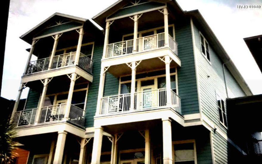 Spacious 2-story 1-bedroom Condo with Pool and Courtyard Views! Island Reserve is a gated community that's truly an oasis at the beach. Resort style lagoon pool w/lap area, zero entry, and waterfall. Indoor basketball court, fitness center, game room and theater. Low HOA fees include water, sewer, garbage, landscaping, amenities, security and insurance for outside of building . This condo's ideal as a permanent home, vacation getaway, or investment for rental income. Perfect for all buyers! This is a 1 bedroom 1.5 bath. 10-foot ceilings, crown molding, hardwood and tile floors on the first floor. Kitchen features granite counters and breakfast bar, under cabinet lighting, disposal, and GE stainless steel appliance package w/fridge, glass top stove/oven, microwave and dishwasher. Full size washer and dryer upstairs included. 2 balconies overlooking courtyard and pool. Furniture negotiable.