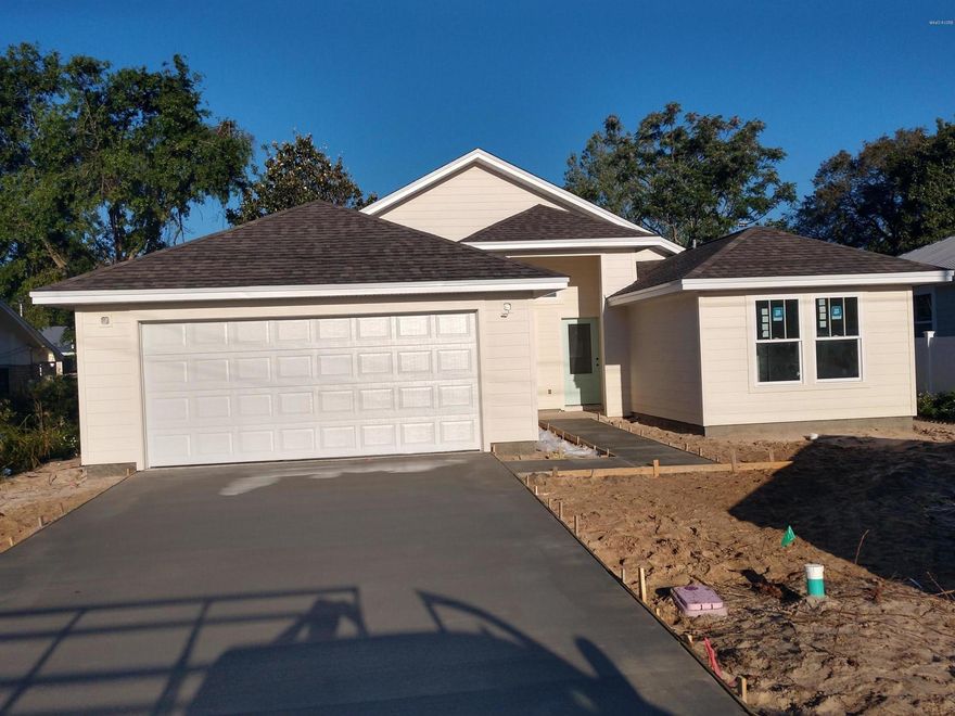 Perfectly located home or beach house. 2 blocks east of Hwy 79 between Back Beach Rd and  Gulf!  Split BR plan w/ vaulted entry, GR, DR, kitchen and breakfast.  Lots of storage, walk-in closed in m/ba, Large bar with room for 4, kitchen island, porch, huge vanity w/double sinks in Mtr, 2 car gar, granite, laminate flooring, carpet only in BRs.  Designer lighting & finishing. Should be completed in 2​​‌​​​​‌​‌​​​​‌​​‌​​​​‌‌ weeks!