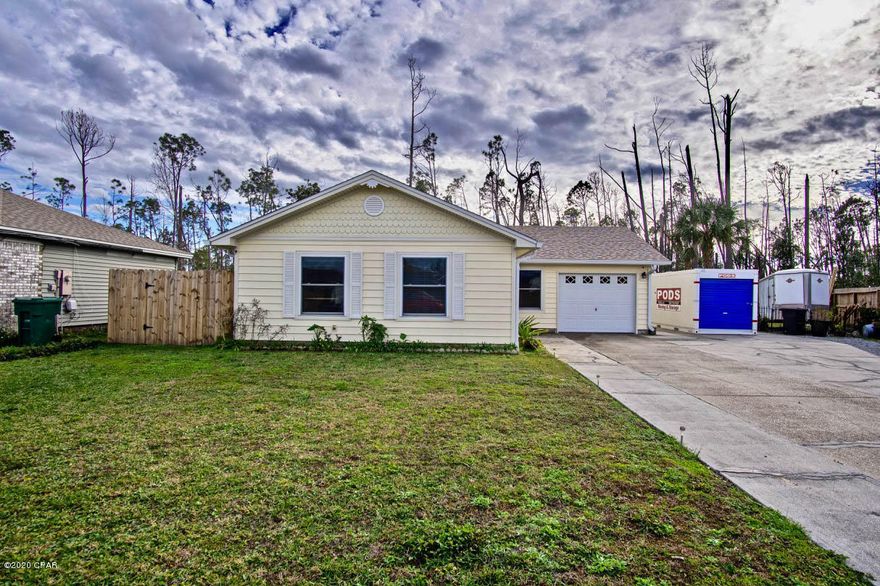 This beautiful GEM of a home in the Callaway Forest subdivision is an absolute MUST SEE!! This home has 1,127 sq.ft. of very comfortable living space with 3 bedrooms and 2 bathrooms. The newly remodeled custom kitchen is sure to bring out your inner chef and boasts stunning granite countertops, self closing cabinet doors, and new paint and floor tile. Conveniently located near Tyndall Air Force Base and just a stroll away to the Bay. This beautifully landscaped home has a complete sprinkler system accommodating many plants, flowers, and even fruit trees on the property. Step into the fenced in backyard and experience the lush landscaping and TWO outdoor sheds (24x12 and 8x8) with electricity. This home also has a one car garage, multiple driveway spaces AND additional space for a boat or RV!!