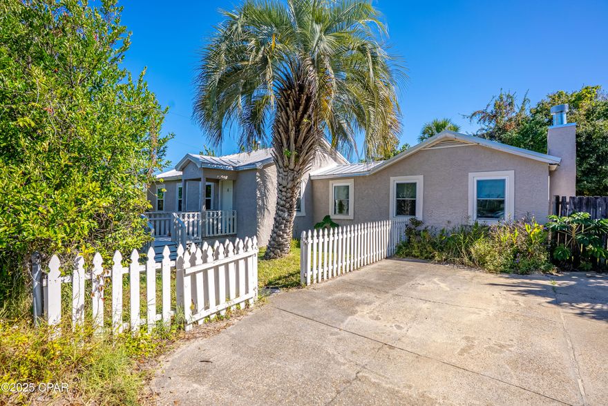 Must Sell! Charming single story split bedroom Florida cottage located in central area of Panama City. This 3 bedroom, 2 bath home provides 1558 sq ft of generous space to move about. The Living room area is very spacious and features wood burning fireplace. The Kitchen is equipped with gas range and refrigerator. Just off the kitchen is large 11x14 dining area. Foyer area would be ideal for small office/work station. Large walk in closets. The entry into the home features a walk ramp, and there is a huge back deck ideal for entertaining & the weekend BBQ's. Two sheds!  Two separate water heaters. All windows replaced after hurricane Michael. Metal roof- installed 2014. Shopping and schools are within 5 minute drive. Call for your showing