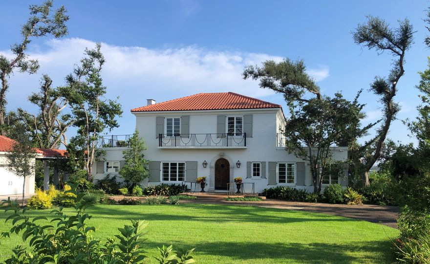 This beautiful Cove waterfront home offers the charm of yesterday with the luxuries of today's lifestyle.  This home sold after the storm and all damage, which was minor from the storm had been repaired. Home being entered for comp purposes.