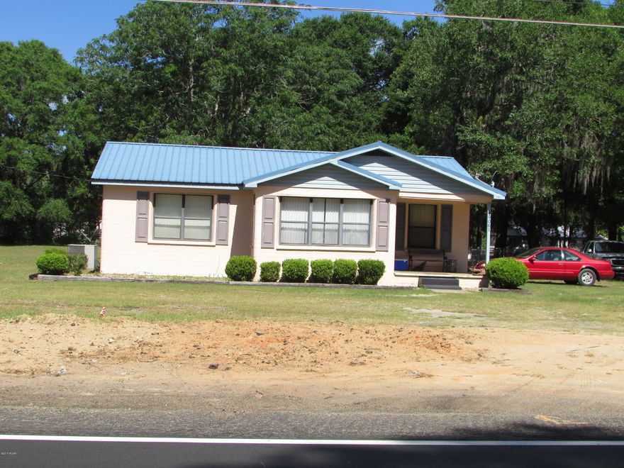 Brick home in Bristol Florida! Easy access to Tallahassee or Panama City! 3 Bedroom 1 Bath home with 1009 sq ft! Sitting on a fenced 1.25 acre lot! Wood Floors, central AC/Heat. 2 Car Carport.  Metal Roof. This home is priced to sell so call today for your personal showing!!