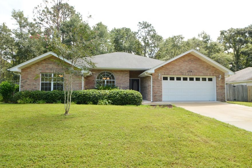 FRESH PAINT! NEW CARPET! This home is only a few minutes from town and close to Deerpoint Lake; a great location for country and convenience. The gorgeous, spacious split floor plan provides the elbow room you require but the comfort you desire. Hardwood floors, crown molding and french doors add a classy finish. The large eat in kitchen will make that avid cook very happy and the formal dining area  is versatile for an office or reading space. The master bedroom is very roomy and easily holds a king size bed with plenty of room to spare...and don't forget about the two walk in closets! Like to entertain? The open Florida room and beautifully shaded, private backyard are the perfect spots for your guests, children or furry friends! This home sweet home is waiting for you! All measurements are approximate and should be verified if important