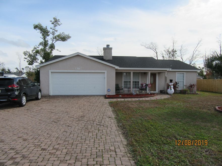 Gorgeous 3 Bedroom 2 Bath Lynn Haven home is located on a large lot with a fenced back yard. Covered lanai and outdoor grill with room for entertaining. Inside you are greeted by wood plank flooring throughout and a brick fireplace. Breakfast bar in the kitchen with stainless steel appliances. 2 car garage and storage shed in the back.All property sizes and ages are approximate, please measure and/or verify if important.

School assignments are subject to change, please check with Bay County for most accurate information.

Deposit is the same as the rent.Dogs allowed with owner approval and NON REFUNDABLE pet fee applies per pet. Breed restrictions apply. No Cats . Owner occupied 24 hour notice to show