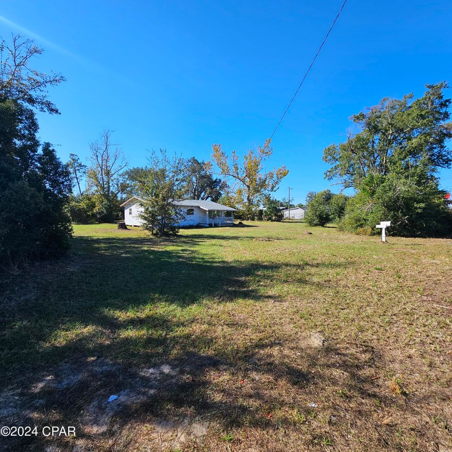 Rare opportunity for 1 acre commercial with a home to convert to an office. 180ft on Hwy 22. Corner lot with great visibility and central location. The perfect setup for a business that doesn't need a large office but needs a large lot for trucks, supplies, materials, additional structures, etc. Currently zoned R6 residential but the City of Callaway said could be easily changed for many types of businesses as commercial is dominate in the area. The home has a new roof, front porch and original hardwood floors. Needs some repairs and updates. City water and sewer.