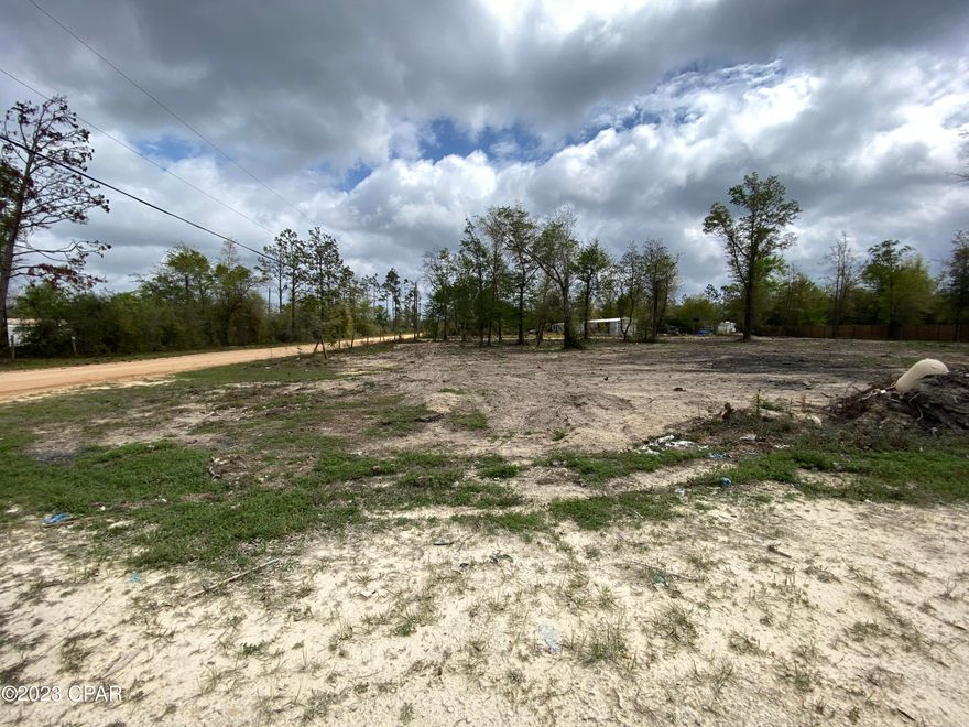 CLEARED 1.01 acres in the country waiting for you to build your dream home. This parcel is located at the corner of W White Rd. and Happyville Rd. in Youngstown, FL. Only 20 miles to downtown Panama City and 8 miles to Fountain. Mobile homes ARE allowed here. There is an old well that needs a pump. Septic needed. Meter box will need inspection prior to connection.