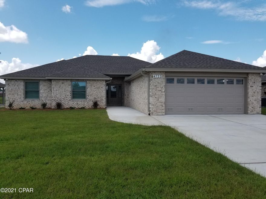 Open Today 10am-3pm. Need a large home well this 3 bedroom 2.5 bath 2 car garage with man cave added all brick home that offers large open floor plan. Master bath with his & hers double shower with Rain maker (3 shower heads) and shower seat, double vanity, large master bedroom with built-in rope lighting and large walk-in closet. The kitchen is a dream with all real wood cabinets, granite countertops, sink in island, stainless steel appliances. There are cabinets in the laundry room. Living room with high ceilings, electric fire place, crown molding and wired for entertainment. Home comes with large Florida room, front porch, both covered and open back porch, security system, thermseal spry foam system and generator ready electrical outlet with cord. outside shower and sprinkler system