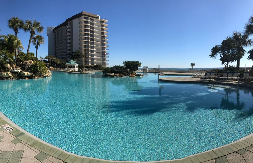 Affordable and nicely upgraded condo for sale right on the beach at Edgewater Beach & Golf Resort! Beautiful flooring, fully furnished, cute kitchen with island. Tower III is next to the main lagoon pool and has it's own heated pool and hot tub. Indulge yourself with tropical pools, hot tubs, sun decks. Restaurant, Room Service, Poolside Bar, Pizza Shop, Market. The Sports Club offers Unlimited Golf, Pro Shop, Gym, Tennis, Basketball, Shuffleboard. Bella Salon & Spa services available. Kids Club with special events & activities! Owner Pets Welcome! 24-hour Security, Gated Entrances. Walkable to shopping, dining, entertainment. On trolley line to popular Pier Park.