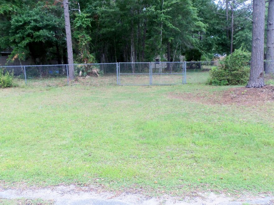 Nice big half acre lot in area of custom homes convenient to PC and Lynn Haven but actually in the County. ATTN BUILDERS!!

Great building lot for custom home. Lot is almost completely fenced...Big metal storage building w/garage door on site stays with lot. Zoned R-1 (Single Family) Bay County. Flood Zone X - Flood insurance NOT required.