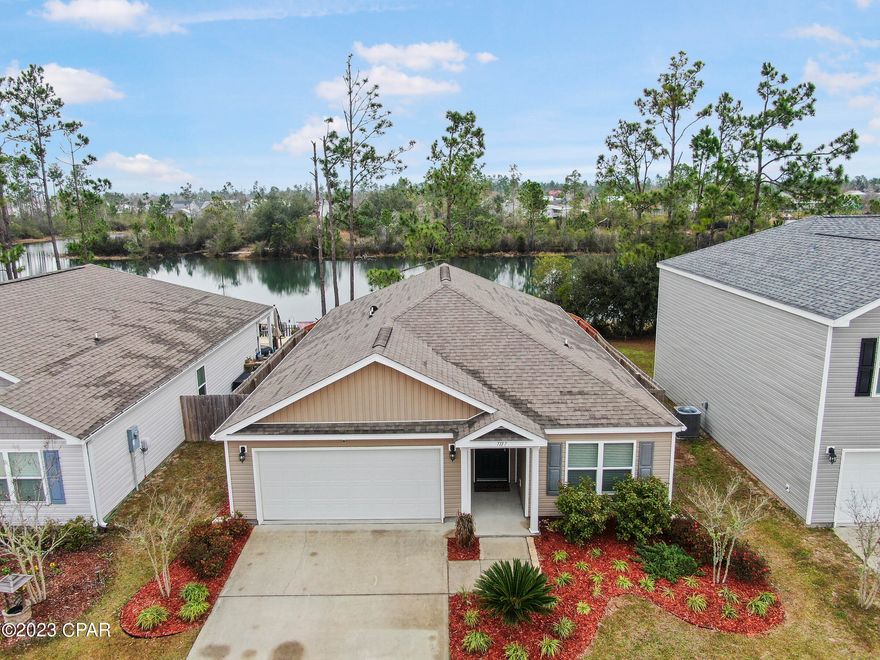 Price improvement! This 3br 2bath home is waiting for you.  Great starter home with a water view! This split floorplan home is located in Barrett's Park. The home features an open concept with a large kitchen island, abundant cabinet space, updated laundry room with folding table and cabinets, backdoor with doggie door, deep well kitchen sink, upgraded appliances and a partial back fence to enjoy the view of the pond while still having a fully fenced backyard.   Measurements are approximate and should be verified if important.