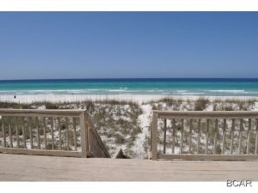 How would you like to have the beach as your backyard? Wake up everyday to a beautiful and unobstructed view of the Gulf of Mexico from this waterfront home. Great open floor plan, each bedroom has a private bath and there is also a half bath. The home was recently updated with new flooring, appliances, fixtures and more. Catch some rays while lounging on the large beachside deck or walk down to the beach and enjoy some sun and surf. The home is conveniently located within walking distance of Pier Park, a great family destination with restaurants, specialty boutiques, name brand department stores and a movie theater with 16 screens including an IMAX. There's also an amphitheater where concerts and other events are held year round. You'll have a front row seat to everything! Like to