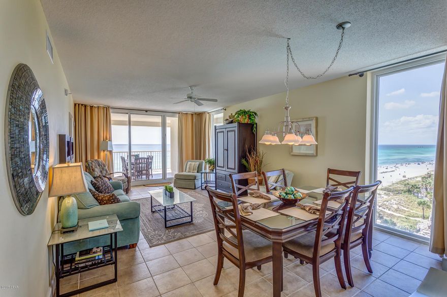 This beautiful condo is located on the highly desirable 7th floor.The open floorplan allows for fabulous Gulf and sunset views from balcony, living room, dining room, kitchen, & master suite providing the ultimate alfresco living and entertaining environment! Sunset views from the private 390 sqft wrap-around balcony are breathtaking. This massive condo has 4 bedrooms & 3 full bathrooms. The Master Suite is on the beachside with direct access to the main balcony. In addition to the sliding glass door, a floor to ceiling window frames amazing views of the beach. Second Bedroom also has its own private bath. Third Guest Bedroom is large and has its own private balcony overlooking pool and beach. This bedroom has easy access to a bathroom that is shared with the Fourth Bedroom. This condo offers one of the best unobstructed views on the beach. 

The Majestic 'Where Life is the Beach' is centrally located on Front Beach Road in the middle of the action along the strip. Majestic Beach Towers is one of Panama City Beach's most popular resort destinations and offers a very nice array of amenities that include 3 outdoor pools, 2 large heated indoor pools, 3 hot tubs, kiddie pool, state of the art fitness center with his/hers sauna and steam room, stadium style movie theatre, conference facility, private owner's lounge, tennis court, H2O poolside bar and grill and convenience shop that serves Starbuck's, sandwiches, ice cream and more. The resort is located in the heart of Panama City Beach close to shopping, dining, and entertainment. All dimensions are approximate and should be verified by buyer if important.