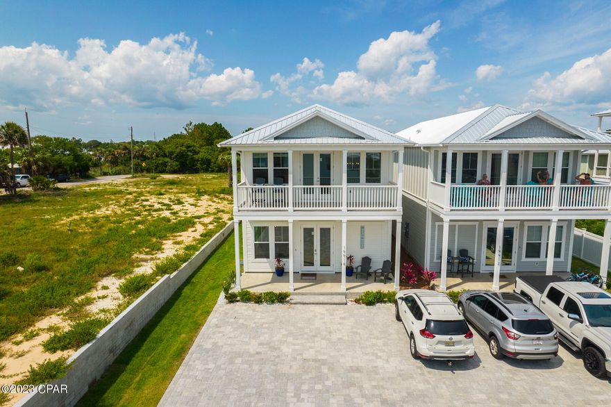 This amazing new construction home offers everything you've been hoping for. Just minutes to 30A and near all things Panama City Beach. Beautiful gulf views await and a gorgeous heated saltwater pool made just for you, including an exquisite entertaining space with a TV, grill, corn hole board, basketball pool goal, and connect four for plenty of fun. This home boasts 5 spacious well designed bedrooms, 4.5 baths, custom chefs' kitchen and custom quality finishings. This is a perfect home for an investment buyer, as well as those looking for a 2nd home or primary residence. Buyer to verify measurements.